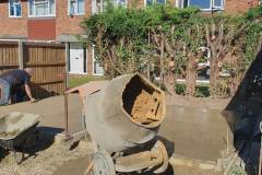 Timber formwork set on levelled gravel base ready for concrete pour